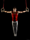 Young Man Exercising on Gymnastic Rings  Bainbridge Island  Washington State  USA