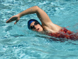 Young Woman Swimming the Freestyle Stroke in a Swimming Pool  Bainbridge Island  Washington  USA