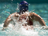 Young Woman Swimming the Butterfly Stroke in a Swimming Pool  Bainbridge Island  Washington  USA