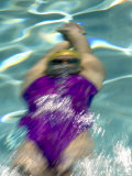 Young Woman Swimming the Backstroke in a Swimming Pool  Bainbridge Island  Washington  USA