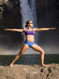 Young Woman Practicing Yoga on a Rock  Snoqualmie Falls  Washington State  USA