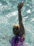 Young Woman Swimming the Backstroke in a Swimming Pool  Bainbridge Island  Washington  USA