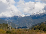 Power Lines Go Through a Wild Mountain Valley