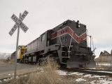 A Train Crosses a Road in Utah in Winter
