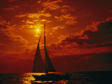 A Silhouette of a Sailboat on Lake Michigan