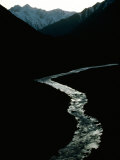 Glistening in the Light  the Obhingo River Flows Down Through the Mountain Vall Eys of Tajikistan