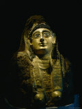 The Golden Covering of a Female Mummy Found at Bahariya