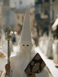 Masked Penitent Photographed During an Easter Celebration