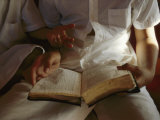Reading an Old Bible During a Service