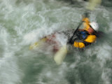 Man Kayaking a Rapid Called Iron Curtain
