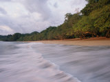 The Surf Washes Ashore on a Lonely Stretch of a Beach