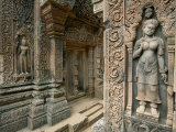 Ornate Carvings and Sculptures of Buddhist Deities Adorn the Outside of a Buddhist Temple
