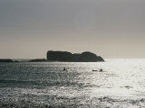 Kayakers Enjoy the Water off the Coast of the Clifton