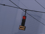 A Stoplight Dangles from a Cable on a Foggy Downtown Seattle Day