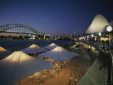 The Harbour Bridge and Opera House Frame an Outdoor Restaurant