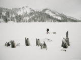 A Ski-Trekker Glides Across the Frozen Surface of Lower Echo Lake