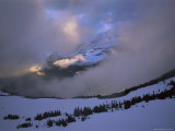 Snow and Clouds Fill the Valley at the Garden Wall in Logan Pass