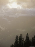 Clouds and Fog Obscure the Valley Along Logan Pass