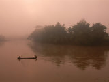 Twilight View of Fishermen in a Canoe