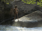 A Pinare Indian Stands by a Stream in Venezuela