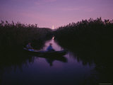 Canoeing at Dusk in the Meadowlands  the Empire State Building is Illuminated in the Background