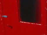 The Red Door of a Fuel Shed