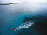 A Skiff Crosses Kantons Lagoon on a Survey of Phoenix Islands