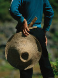 A Farmer Holding a Hat and Knife Near Guilin