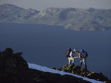 Hikers Pause to Look at Maps Above Lake Tahoe on Mount Tallac  California