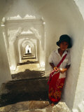A Young Girl Sells Incense Sticks at an Ancient Temple