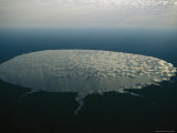 Circle of Clouds Reflected in the Mirrorlike Surface of Lac Tele