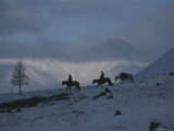 Mongolian Horseback Riders Atop Utreg Pass in the Hordil Mountains