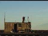 A Wildlife Photographer Sets up Equipment on Hudson Bay