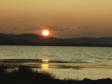 Sunset over Mountains and Water