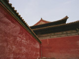 A View of a Wall and the Peak of a Roof of the Forbidden City