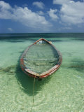 A Boat Submerged in Crystal Clear Water