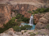 A Blue Waterfall Wets the Arid Landscape of the Grand Canyonl