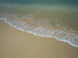 A View of Surf Creeping up onto a Beach