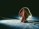 A Model is Traced in Light in This Time Exposure