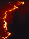 Flames Leap High as a Wildfire Spreads Along a Ridge Line