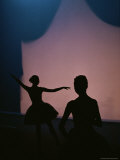 Silhouetted Ballet Dancers Put on a Performance