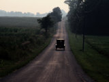 A 1925 Model T Drives Down an Old Strip of the National Road