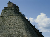 Tourists Scale the Steep Steps of the Pyramid of the Magician