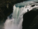 A Person Sits at the Brink of the Salto Grande Waterfall