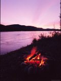A Campfire Glows on the Banks of the Yukon River