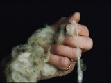 Hand Clutching Spun Wool