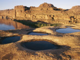 View of Water-Filled Depressions in Rock Formations Near the Colorado River