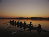 A Crew Team Prepares for Practice at Dawn