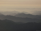 Pollution from Wood-Burning Stoves Hangs over the Olympic Mountains