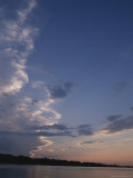 Clouds Form S Curves Across the Vast Sky